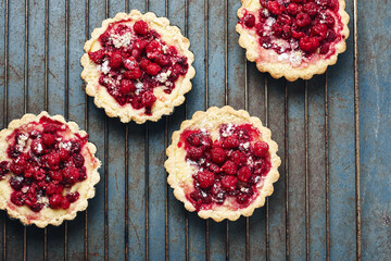 Baked mini tarts with raspberries