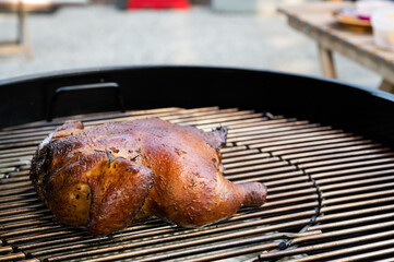 A whole roasted chicken of the grill.