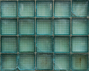 Full frame image of the dirty vintage glass bricks (glass blocks). Old factory window for texture of background