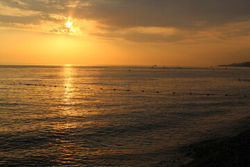 Fototapeta na wymiar Beautiful red sunset over the sea