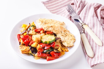 Grilled vegetables and fried chicken breast