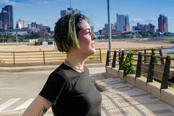 teenager with alternative look strolling on the street