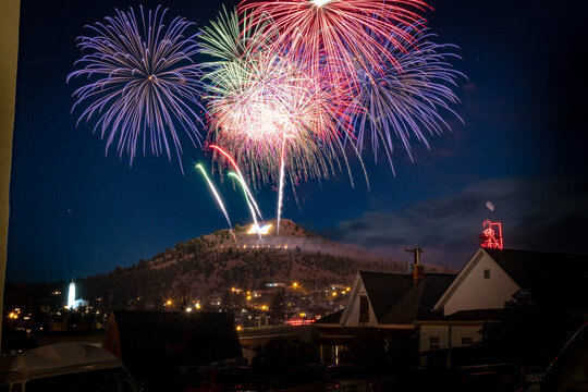 Butte Montana on the 3rd or 4th of July.  Fireworks being shot over Montana Tech.