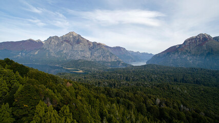 Fototapeta premium Forestry. Aerial view of the forest, lakes and mountain with a rocky peak. 