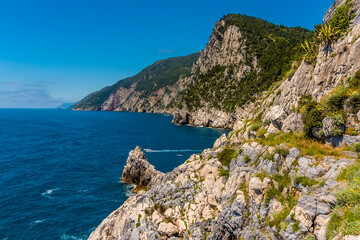 Fototapeta na wymiar A view from the Church of Saint Peter in Porto Venere, Italy along the Cinque Terre coastline in the summertime