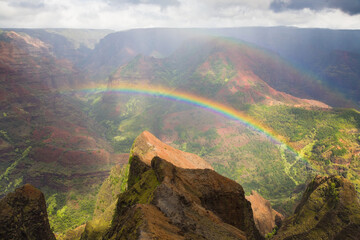 Waimea Canyon, also known as the Grand Canyon of the Pacific, is a large canyon, approximately ten miles long and up to 3,000 feet deep, Kauai, Hawaii