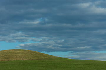 hilly landscape with sky