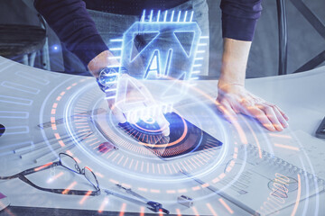 Double exposure of man's hand holding and using a digital device and data theme drawing. Technology...