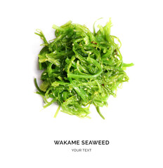 Creative layout made of wakame seaweed. Flat lay. Food concept.  wakame seaweed on white background. © StudioDFlorez