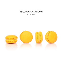 Creative layout made of yellow macaroons on the white background. Flat lay. Food concept. 