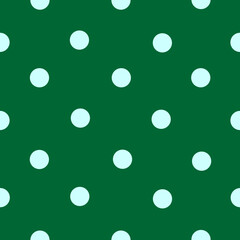 Seamless pattern with circles on green background 