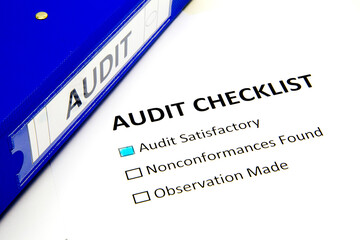 Audit checklist, with tick against "audit satisfactory",