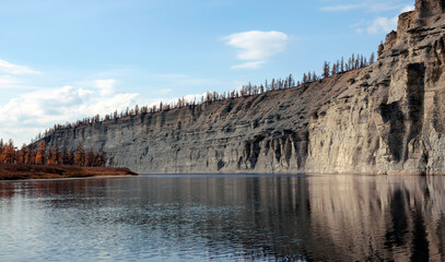 Landscape on the Siberian taiga river during rafting in autumn
