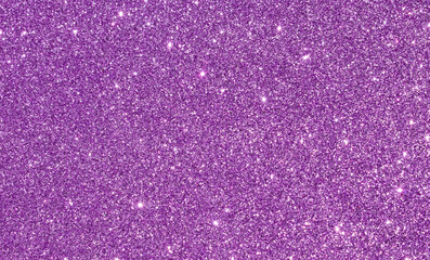 Abstract pink or purple shiny glitter background with shimmering light effects. Image is blank with copy space for text. Great for backdrop, textile, poster, textures, banners and surfaces.