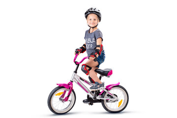 Little girl on a silver pink baby bike