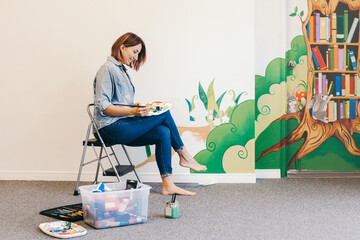 Lifestyle creative hobby and freelance artistic work side job concept. Caucasian woman artist hand...