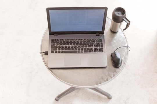 Laptop Cup Table In Chrome Design On White Background, No People Empty Home Office 