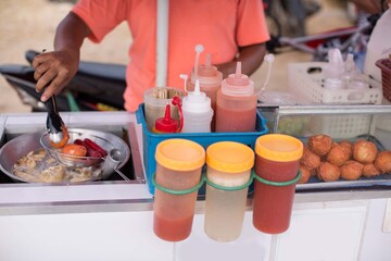 philippine street food tempura and fishballs on a side car market stall