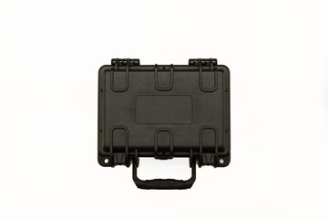 Open black plastic case with foam inside. Black plastic hard case for transporting and storing weapons. on a white background.