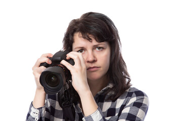 Young female freelance professional photographer or art student or photojournalist on a white...