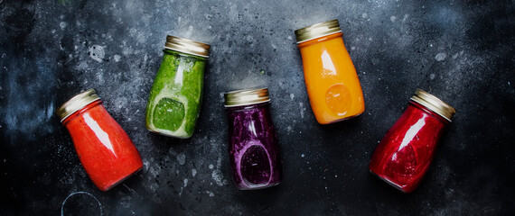 Food and drinks, healthy and useful multicolored vegetable juices and smoothies with ingredients in...