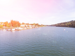 Obraz premium River at sunset with boats, aerial view
