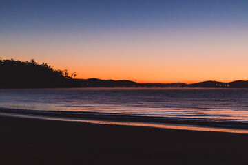 sunset sky with beautiful color gradient over Kingston Beach in Tasmania, Australia