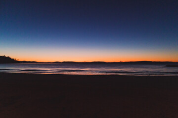 sunset sky with beautiful color gradient over Kingston Beach in Tasmania, Australia