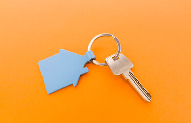 house key on orange background