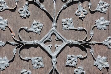 Metal decoration on wooden door