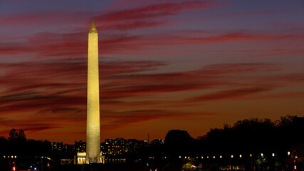 Washington Monument with red cloud  