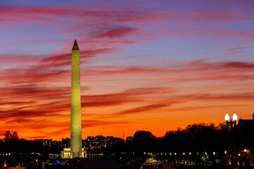 Washington Monument with red cloud  