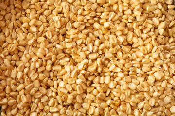 Raw corn texture, yellow grains as background- detail of organic golden corn