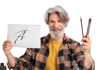 Senior male calligraphist on white background