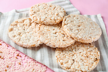 Rice crispbreads on color background