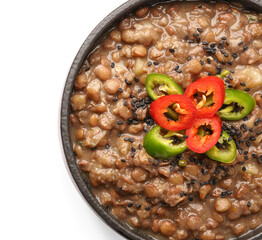 Bowl of tasty lentils soup on white background