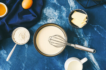 Ingredients for pancakes on color background
