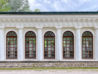 classical building in renaissance style, with large rounded windows and architectural columns