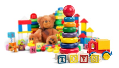 Children toys with bear and ball on the desk