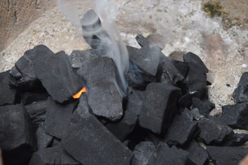 Charcoal with fire in the stove of the old Thai people in Thailand in Bangkok.