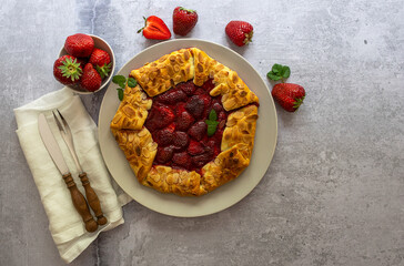 Freshly baked strawberry open pie galette