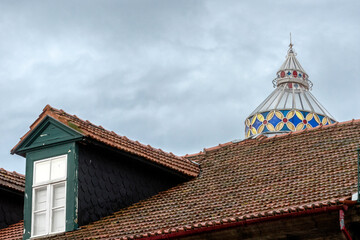 Fototapeta na wymiar transom in colored glass typical of Porto roofs