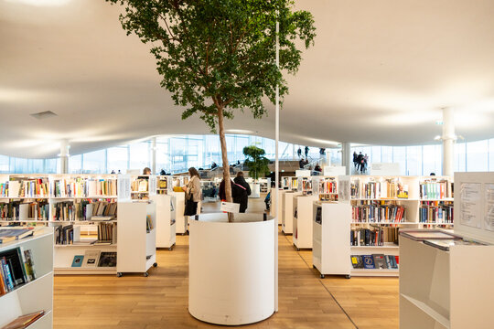 HELSINKI, FINLAND - JANUARY 05, 2020: Helsinki Central Library Oodi, living meeting place with range of services in modern design in city center. Interior inside with glass windows, wooden facade