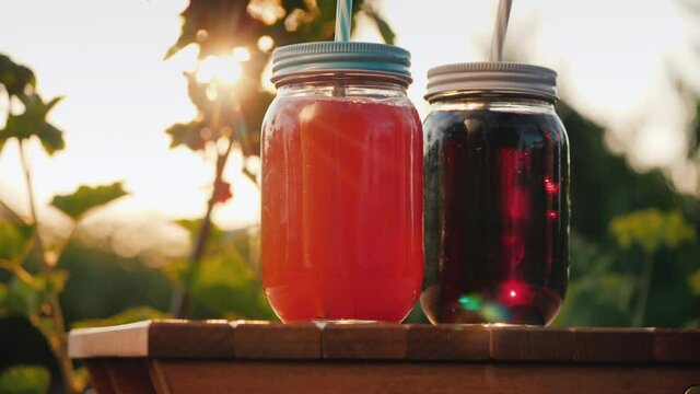 Tilt shot of two soft drinks on the table