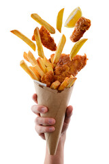 Traditional fish and chips falling out of a paper cone - obrazy, fototapety, plakaty