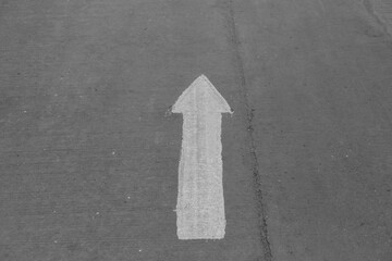 Fototapeta premium Road marking arrow on asphalt