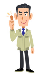 サムズアップする作業着の男性
