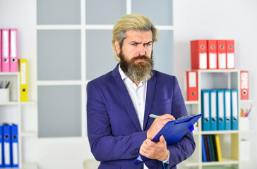 checking the result. businessman hold office folder. business management professional. chief information officer. IT director or CIO. successful crisis manager make notes in documents