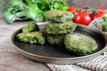  Fried vegetarian patties on a plate with the tomatoes. Healthy vegetarian or vegan food. On a...