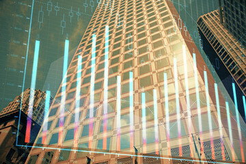 Forex chart on cityscape with tall buildings background multi exposure. Financial research concept.
